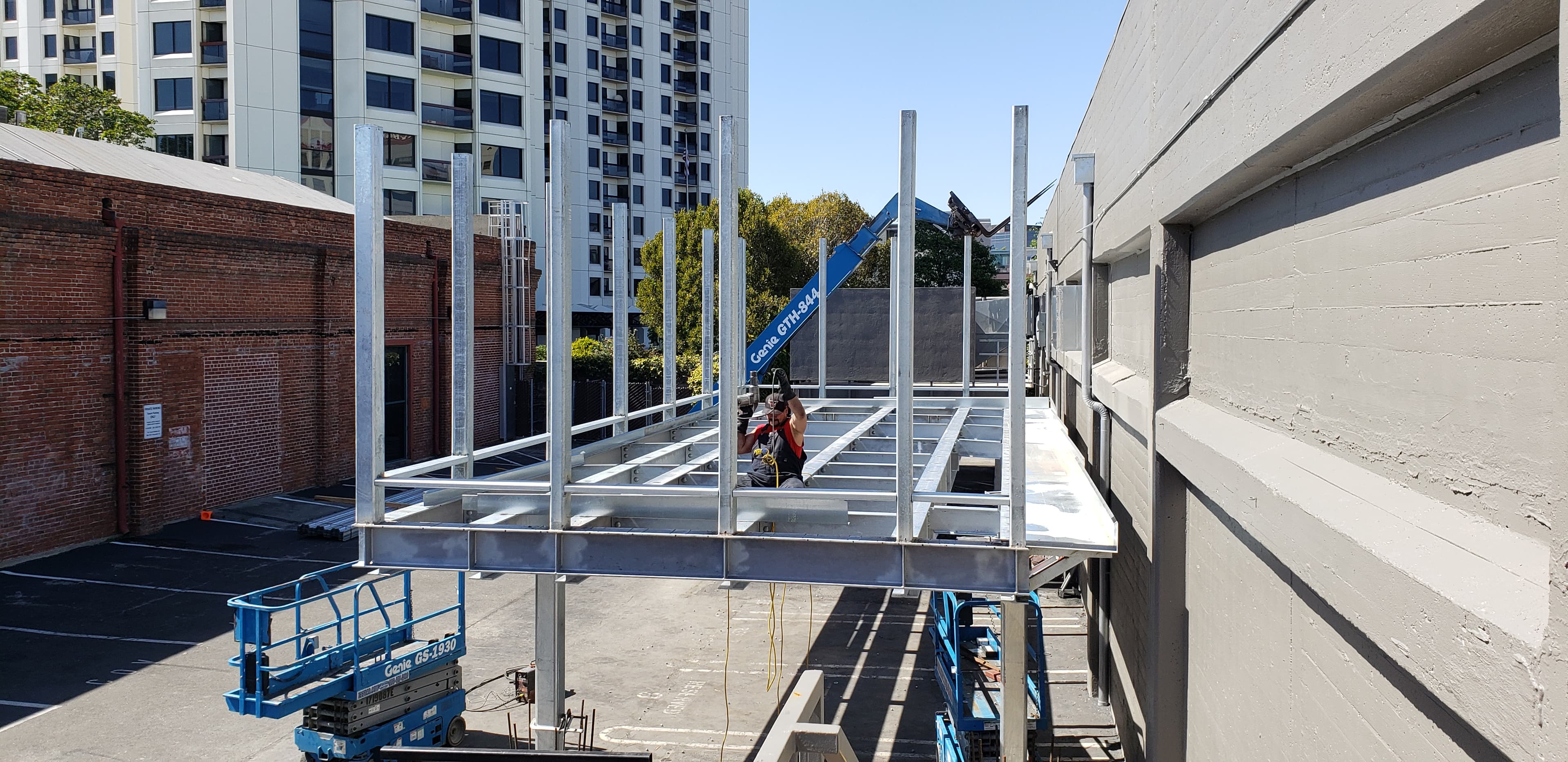 LAB TENANT IMPROVEMENT — Galvanized exterior equipment platform and support steel for a laboratory tenant improvement.